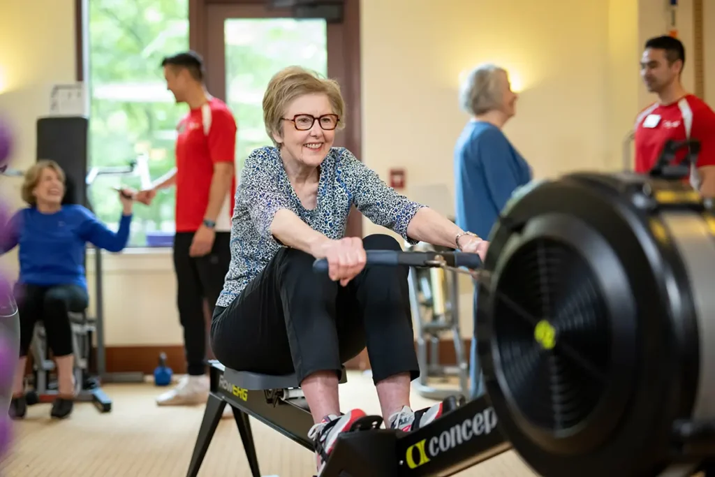 Woman on exercise machine at Fox Hill Residences In Bethesda, MD